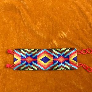 Handmade beaded jewelry Huichol Shakira Guatemala Mexico artisan geometric red
